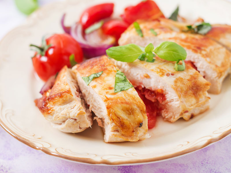 Grilled Chicken Stuffed with Basil and Tomato